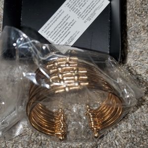 Avon Gold Tone Cuff Bracelet